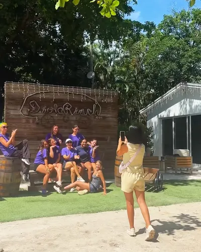 Behind the scenes of an outdoor group photo shoot for a client